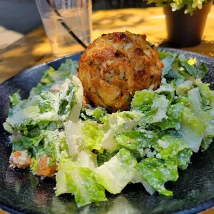 Ceasar salad with jalapeno dressing and a crab cake