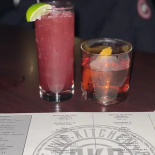 two cocktails on a table