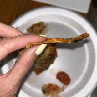 Super thin slice WITH toppings on it