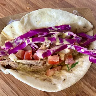 Pork taco with cilantro lime cream