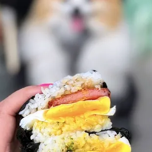 Spam Musubi w/ seared tamari glazed spam, over easy egg, seasoned rice, nori | $5