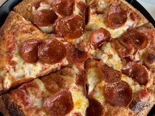 Eric Gordon's Greek's Pizzeria