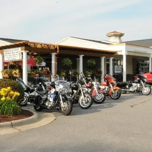 motorcycles parked in front