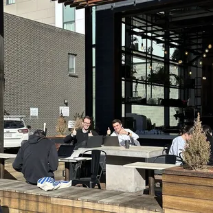 a group of people sitting at a table