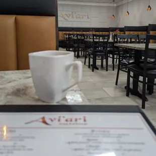 a cup of coffee on a table