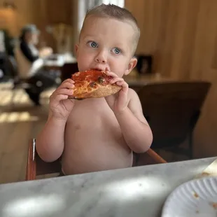 Pepperoni pizza (sorry he's shirtless, I spend so much money on stain remover, I had to save the shirt )