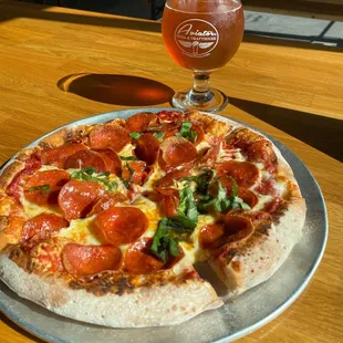 9" Pepperoni and basil pizza and Texas Bishop Strawberry Cider