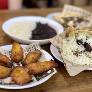 Maduros, pabellon arepa, and black beans and rice