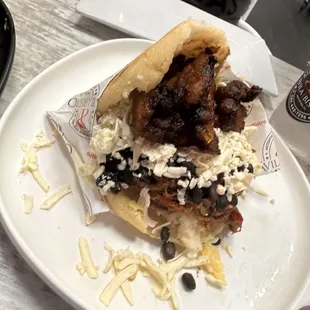 Pabellon Arepa! Was so good! Tons of juicy  beef, plantains cooked perfectly and sweet, beans and cheese! Was amazing meal