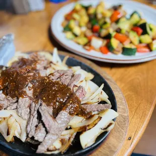 Pepe 's Steak with onions but instead of rice and beans, I opted for the grilled veggies. Fantastico!