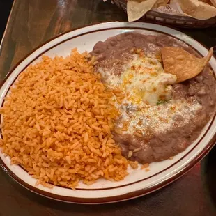 Rice and beans/with some cheese on them, dip a chip and it's a little meal in itself.
