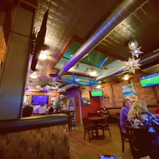 people sitting at a bar