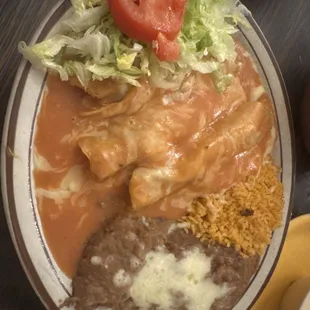 Beef rolled tacos plate