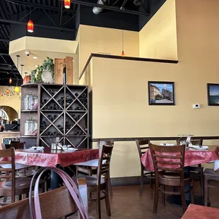 a man sitting at a table in a restaurant