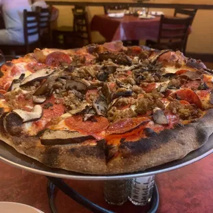 Delicious pepperoni, sausage &amp; mushroom pizza.