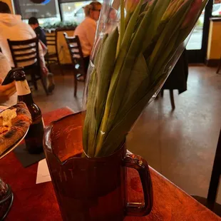 a vase with tulips in it