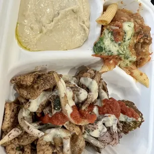 Chicken Shawarma platter with hummus and eggplant penne pasta