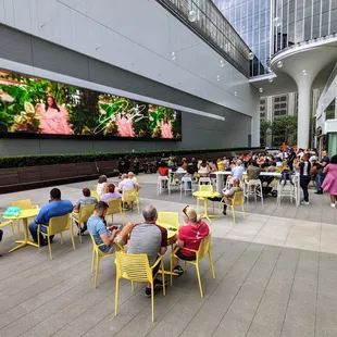 Outside on The Collective Food Hall at Coda&apos;s outdoor patio and breezeway.