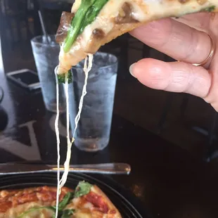 Perfect amount of high quality cheese on the pizza.