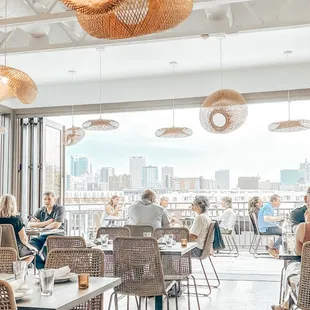 a restaurant with a view of the city