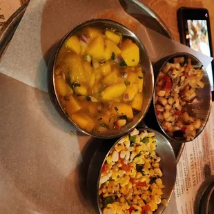 Salsa trio with corn option, pineapple option, and mango habanero. Would get different options or guac next time