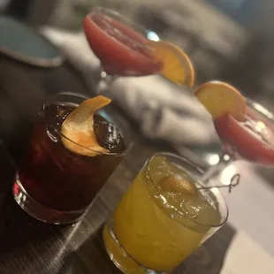 Black Manhattan, honeysuckle spritz (x2), and a satsuma cocktail.