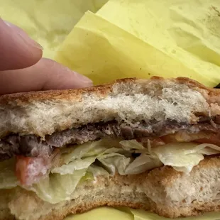A steak sandwich. Where is the beef?