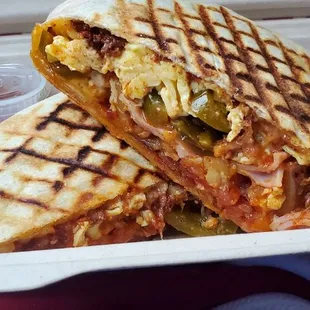 Breakfast Crunchwrap w/ ham, chorizo, jalapeños and hot sauce added