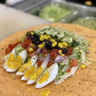 Mel&apos;s Super Veggie Wrap on a Tomato tortilla