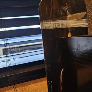 Broken seating. Repaired with clear Scotch tape.