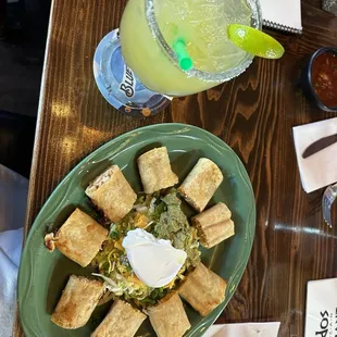 House margarita and taquitos rancheros