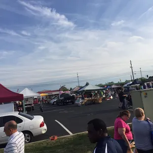 a crowd of people walking around