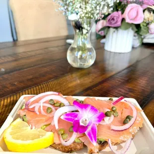Avocado Toast with Smoked Salmon, red onion, &amp; capers! Beautiful and tasty