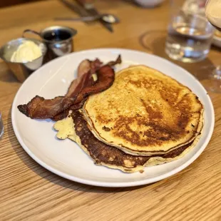 Pancakes with lemon-ricotta, maple syrup, bacon