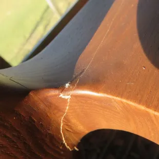 Each chair cracked in same area