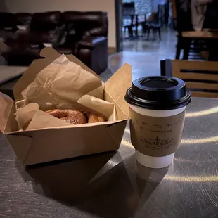 Naked cinnamon bun and coffee