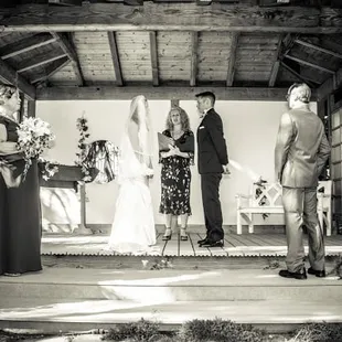 Officiant, Rev. Andrea Archuleta, celebrates a fall garden wedding.