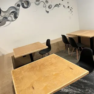 tables and chairs in a coffee shop