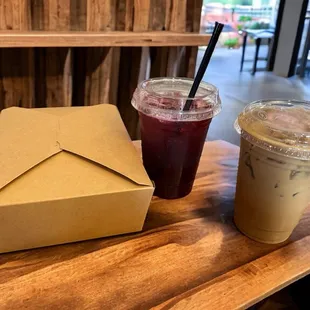 two drinks and a box on a table