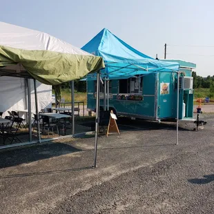 a blue and white trailer