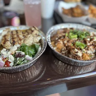 Mediterranean Chicken plate and loaded taco tots