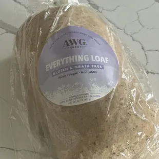 a bag of bread wrapped in plastic