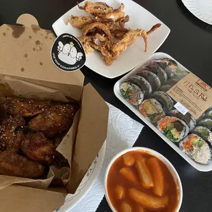 Soy garlic chicken, spicy rice cake ( tok poki) fried squid, variety Kim bob
