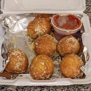 Famous cheeseballs. Could have been softer, and the cheese could have used more flavor, but overall not bad