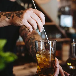 a bartender mixing a drink