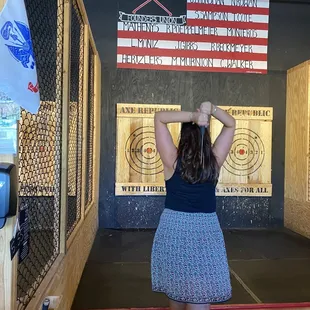 a woman standing in front of a target