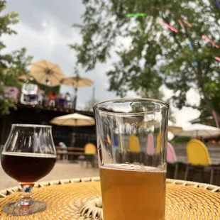 two glasses of beer on a table