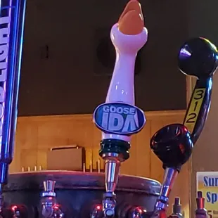 a beer tap with a beer in it