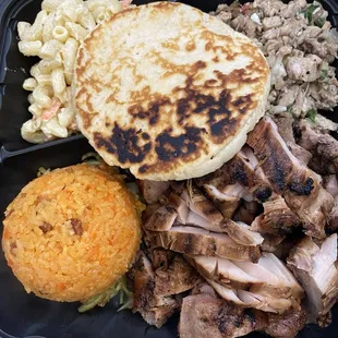 BBQ chicken, chicken kelaguen, Chamorro red rice, Mac salad and titiyas.