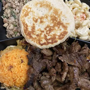 BBQ beef, chicken kelaguen, Mac salad, Chamorro red rice and titiyas.